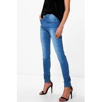 mid rise mid wash skinny jeans mid blue