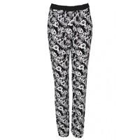 mono tropical print trousers