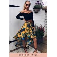 monica mustard floral dip hem skirt