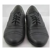 M&S, size 13 kids black leather jazz punch hole lace ups