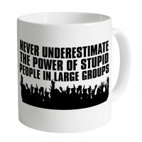 never underestimate mug