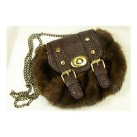 Next faux fur medium shoulder/cross body bag in a Sporran design with long chain.