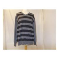 next size large grey striped jumper