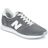 New Balance U220 men\'s Shoes (Trainers) in grey
