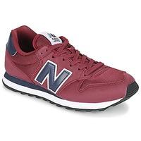 New Balance GM500 men\'s Shoes (Trainers) in red