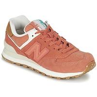 New Balance WL574 women\'s Shoes (Trainers) in orange