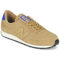 New Balance U410 women\'s Shoes (Trainers) in BEIGE