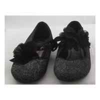 Next, size 3 black silver glitter pumps