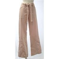 Next, size 8 pale pink trousers