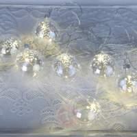 Nine-piece LED string lights Vesta 9 made of glass