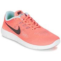 nike free run grade school girlss childrens shoes trainers in orange