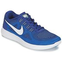 Nike FREE RUN 2 men\'s Running Trainers in blue