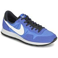 Nike AIR PEGASUS 83 men\'s Shoes (Trainers) in blue