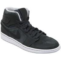 Nike Air Jordan 1 Mid Nouveau men\'s Shoes (High-top Trainers) in Grey