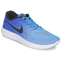 Nike FREE RUN men\'s Running Trainers in blue