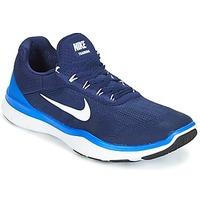 Nike FREE TRAINER 7 men\'s Trainers in blue