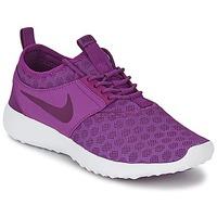 nike juvenate womens shoes trainers in purple