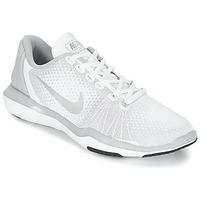 Nike FLEX SUPREME TRAINER 5 W women\'s Trainers in white
