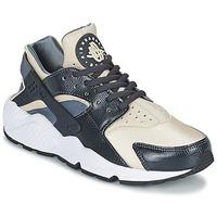 nike air huarache run w womens shoes trainers in grey