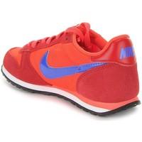 Nike Wmns Genicco women\'s Shoes (Trainers) in red