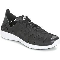 Nike JUVENATE WOVEN W women\'s Shoes (Trainers) in black