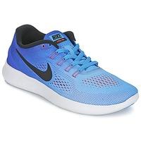 Nike FREE RUN W women\'s Running Trainers in blue