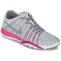 Nike FREE TRAINER 6 W women\'s Trainers in grey