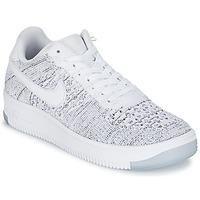 Nike AIR FORCE 1 FLYKNIT LOW W women\'s Shoes (Trainers) in white