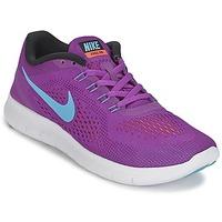 Nike FREE RUN W women\'s Running Trainers in purple
