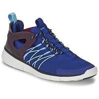 Nike FREE VIRTUS women\'s Shoes (Trainers) in blue