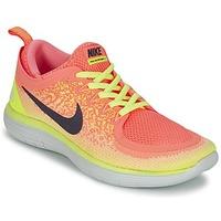 Nike FREE RUN DISTANCE 2 women\'s Running Trainers in orange