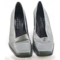 nine west size 7 silvery grey slip on shoes