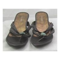 Nine West, size 6 brown kitten heeled flip flop style sandals