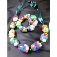 one button multi coloured necklace bracelet set