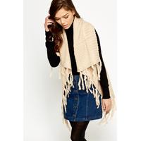 open fringed poncho