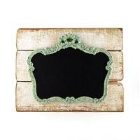 ornate vintage chalkboard mounted on faux wood