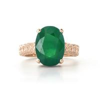 oval cut emerald ring in 9ct rose gold