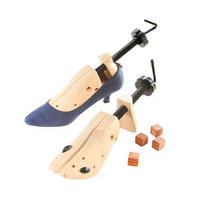 pair of wooden shoe stretchers with cedar deodorising blocks wood