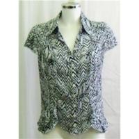 per una black and white patterned blouse size 12