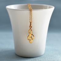 personalised gold treble clef necklace