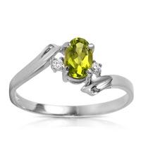 peridot and diamond embrace ring 045ct in 9ct white gold