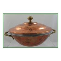 planished copper serving dish with lid