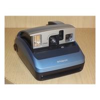 Polaroid One 600 instant film camera.