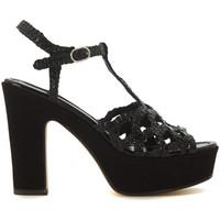 Pon´s Quintana Genova black woven leather heel women\'s Sandals in black