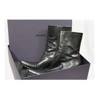 Prada, size 6/39.5 Capretto Fume black ankle boots