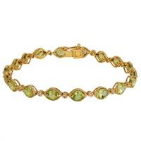 pre owned 18ct yellow gold peridot and diamond bracelet 4307739