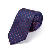 red polka dots on navy woven silk tie