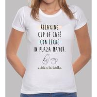 relaxing cup of coffee with milk in plaza mayor (girl)