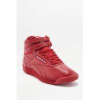 reebok freestyle red high top trainers red