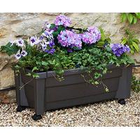 rissington self watering wheeled planter grey polyethylene